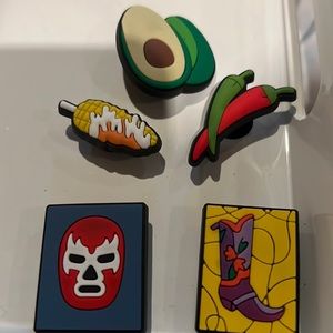 Five Croc charms available.